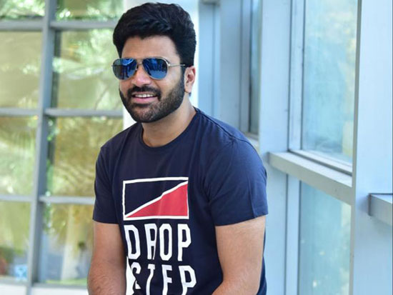 Suave And Stylish Looks Of Sharwanandh At Promotions